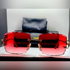 Men’s Red or Ruby Cartier Sunglasses
Or Women’s